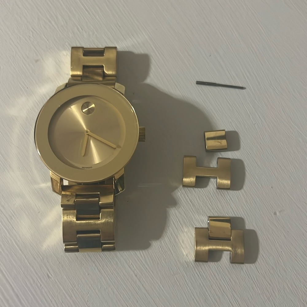 Gold women’s Movado watch